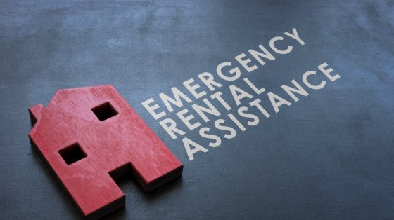 Emergency Rental Assistance Program ERAP. Red wooden home on the blackboard.
